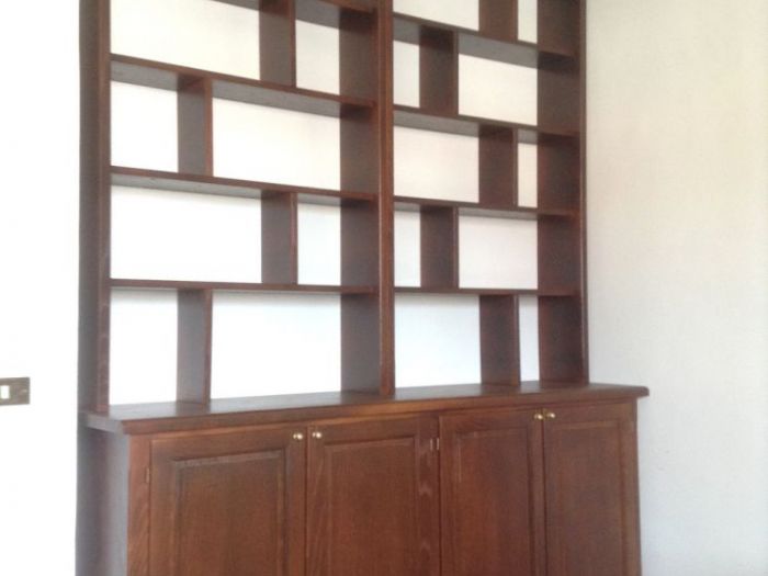 Archisio - Magnolialab - Progetto Mobili in legno masselo