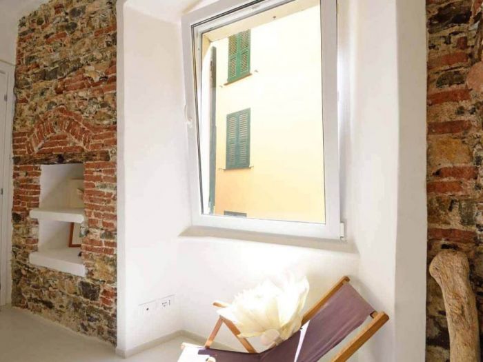 Archisio - Roberto Silvestri - Progetto Una casa a camogli storie e pareti colorate