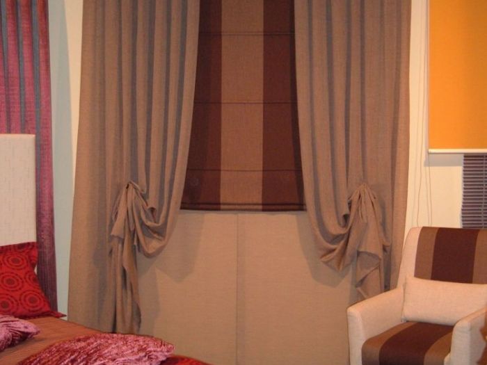 Archisio - Pezzoni Tappezzeria Tendaggi - Progetto Tende