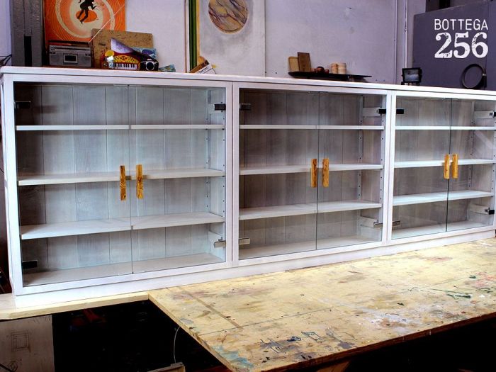 Archisio - Bottega 256 - Progetto Eco-libreria frassino massello