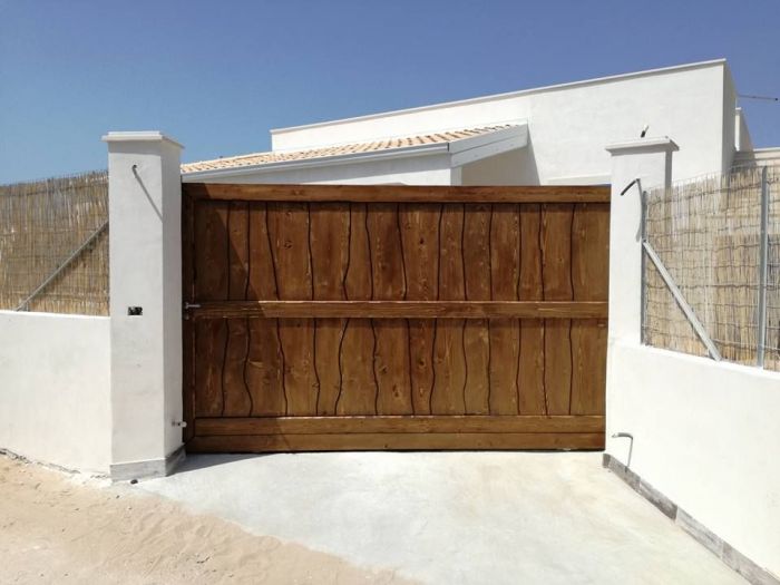 Archisio - Falegnameria Tuccitto - Progetto Porte in legno