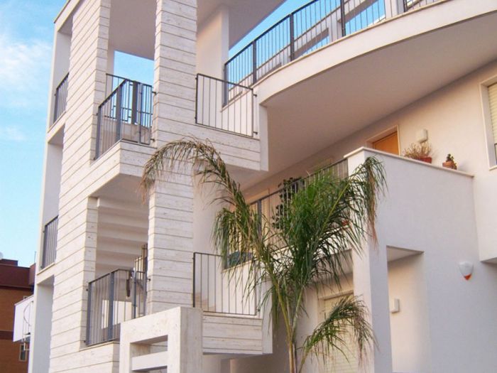 Archisio - Marmigraniti srl - Progetto Rivestimenti interni - rivestimenti esterni