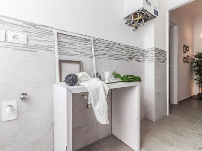 Archisio - Marina Ghedini - Progetto Home staging full con mobili di cartone