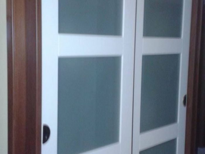 Archisio - Falegnameria Salvioli - Progetto Porta in legno scorrevole