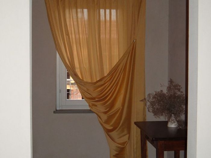 Archisio - Pezzoni Tappezzeria Tendaggi - Progetto Tende