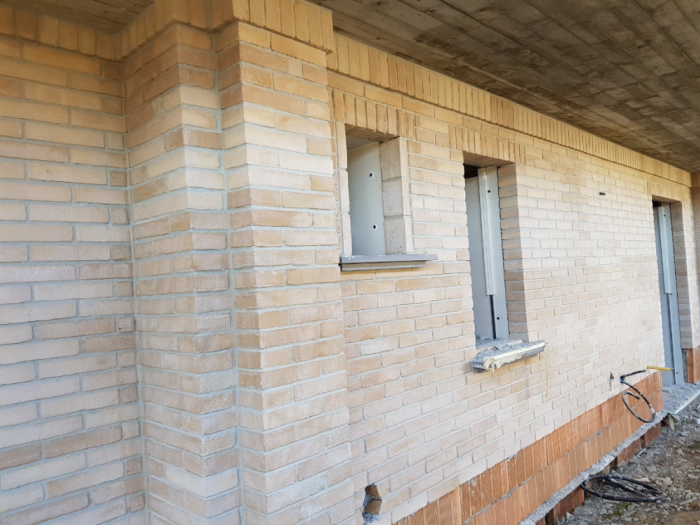 Archisio - Impresa Sharon Srls - Progetto Appartamentiville lavorazione mattoni faccia a vista e rivestimenti in pietra