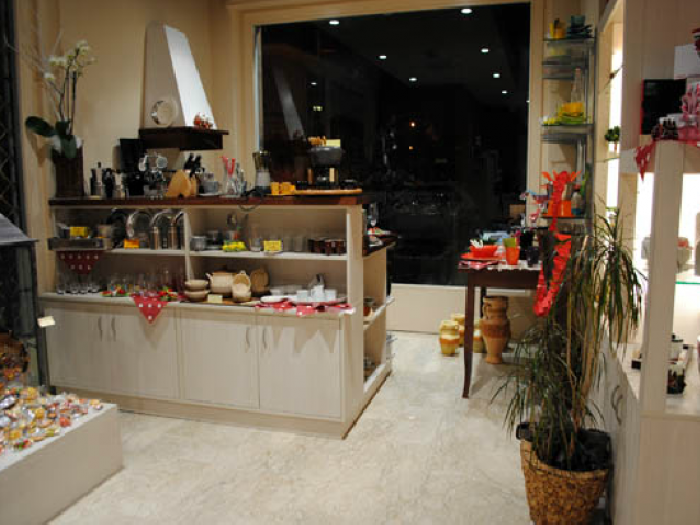 Archisio - Cotto Arredamenti - Progetto Abbigliamento e articoli regalo