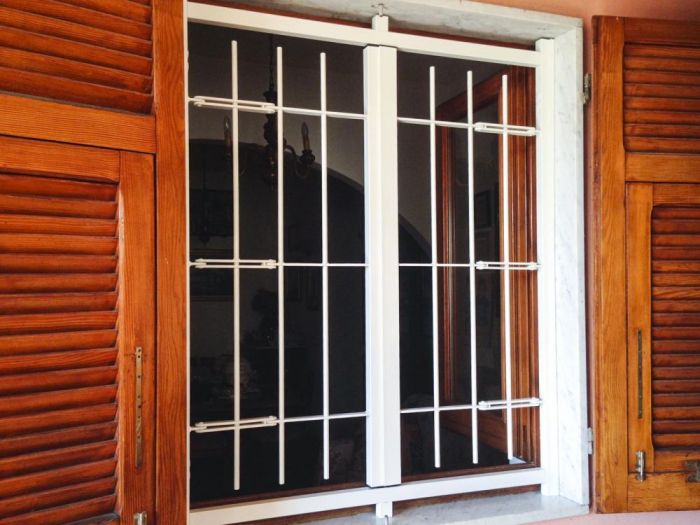 Archisio - Ferro Su Ferro - Progetto Scuri persiane e grate blindate