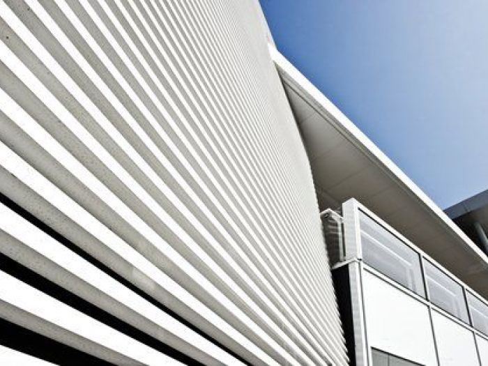 Archisio - Studio Merlini - Progetto Commercial building - restyling edificio commerciale