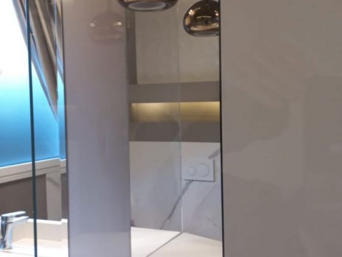 Archisio - Paola Illuminazione - Progetto La luce spettacolo ed arredo