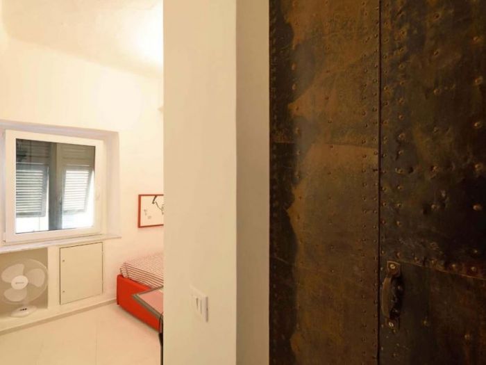 Archisio - Roberto Silvestri - Progetto Una casa a camogli storie e pareti colorate