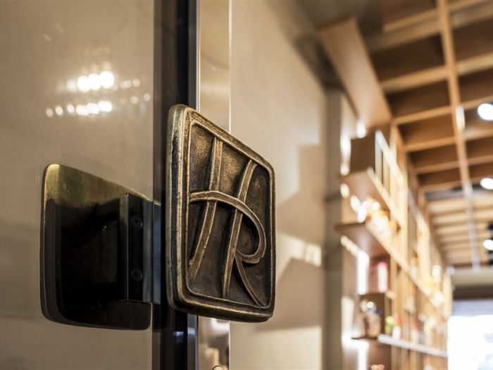 Archisio - Noa Network Of Architecture - Progetto Hofer da 1845 pasticceria ricca di tradizioni con atmosfera moderna