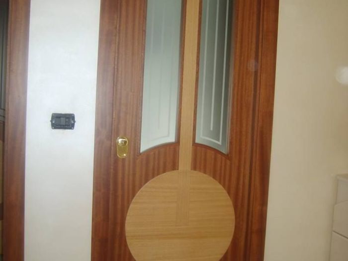 Archisio - Falegnameria Salvioli - Progetto Porta in legno