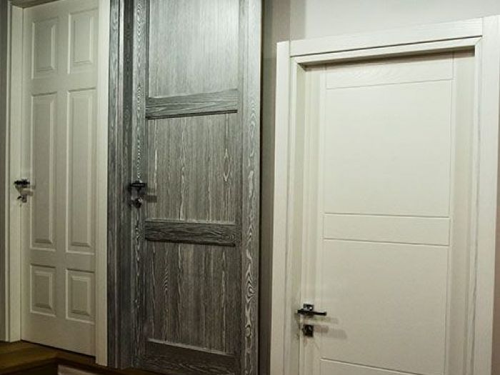 Archisio - Wood Trade Roma - Progetto Porte