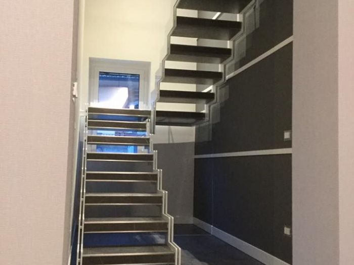 Archisio - Decora srl - Progetto Design scala interna