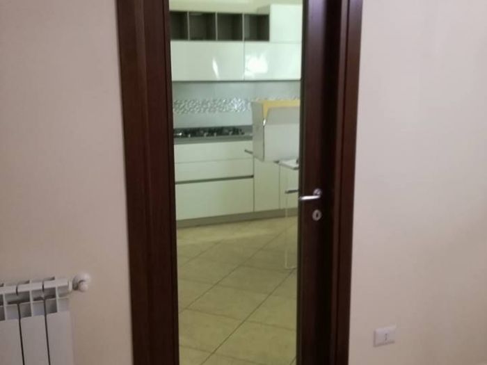 Archisio - Lo Coco I Vetrai Snc - Progetto Porta in vetro