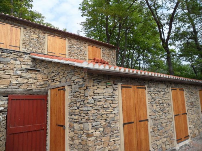 Archisio - Edil Sorbara srl - Progetto Costruzione villetta rivestita in pietra