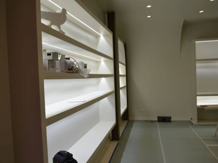 Archisio - Decora srl - Progetto Ristrutturazione negozio di abbigliamento