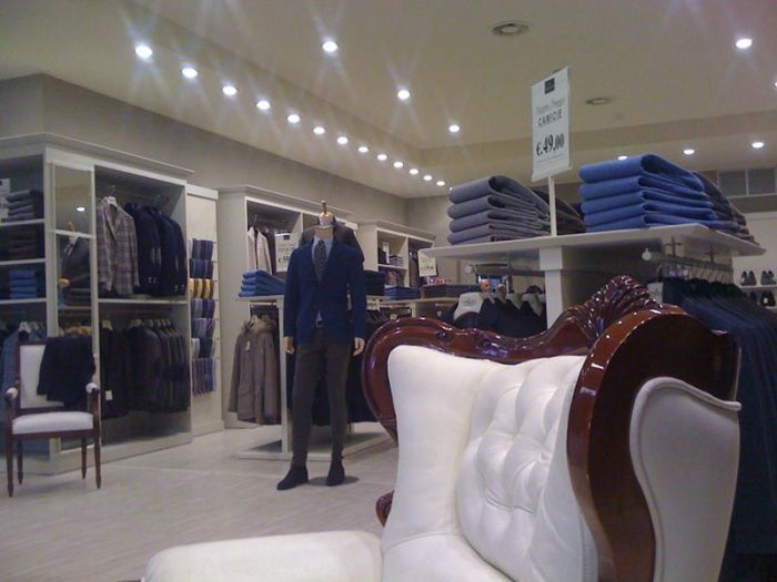 Archisio - Uno Fabbrica srl - Progetto Arredo negozi