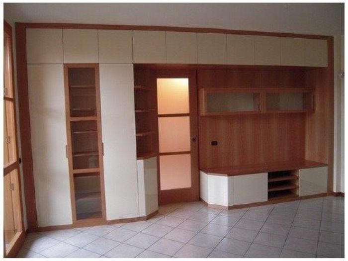 Archisio - Cordel Srl Arredamenti Artigianali - Progetto Parete soggiorno con porta scorrevole integrata