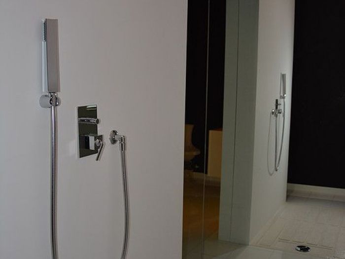 Archisio - Calabra Marmi - Progetto Bagni