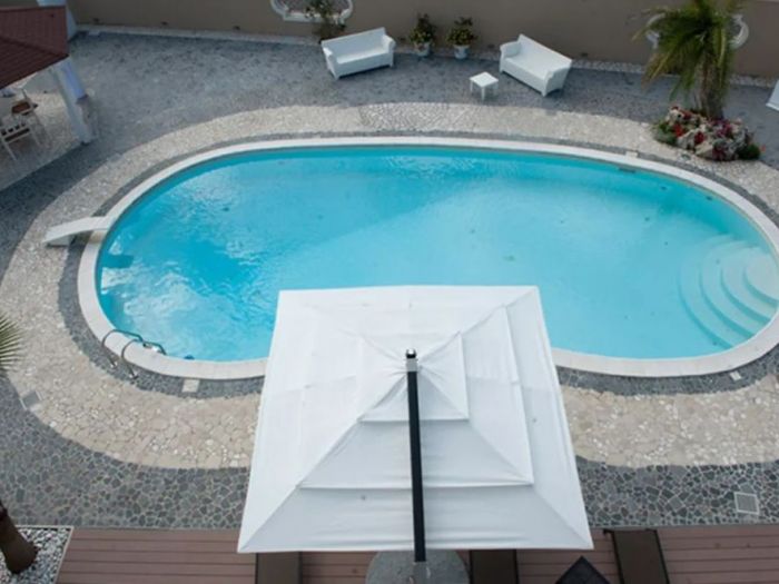 Archisio - Raffaele Carrella - Progetto Villa monofamiliare con piscina