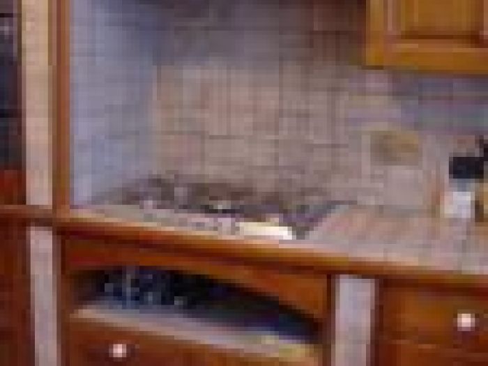 Archisio - I Ciottoli Romani - Progetto Cucine