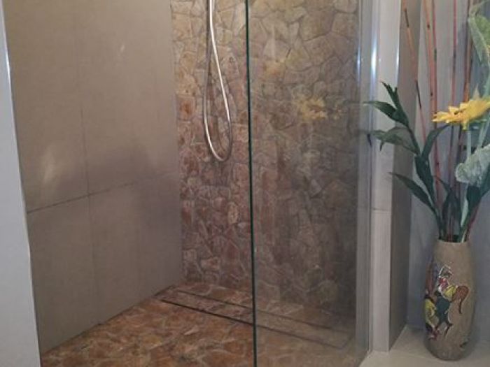 Archisio - Malagrida Group Srl Canalina Infinity - Progetto Villa privata - interno bagno