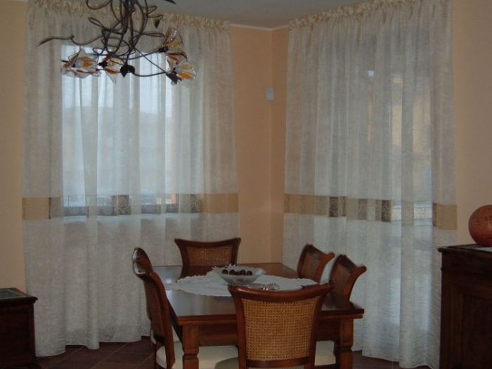 Archisio - Pezzoni Tappezzeria Tendaggi - Progetto Tende