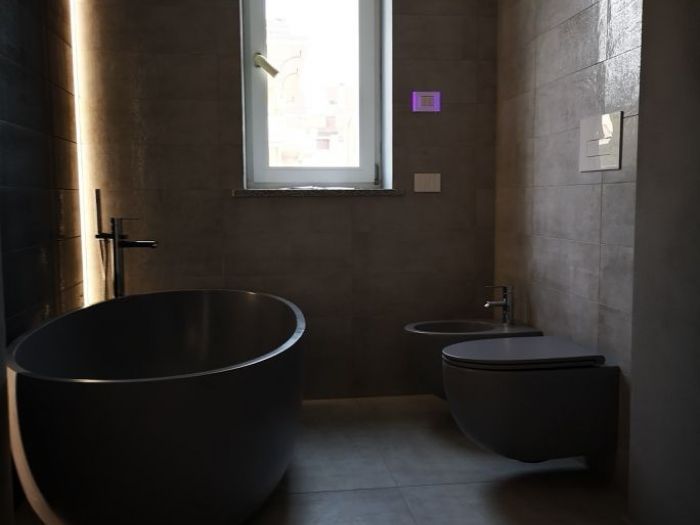 Archisio - Gilardi Interiors On Staging - Progetto Bagno con vasca freestanding e giochi di luce