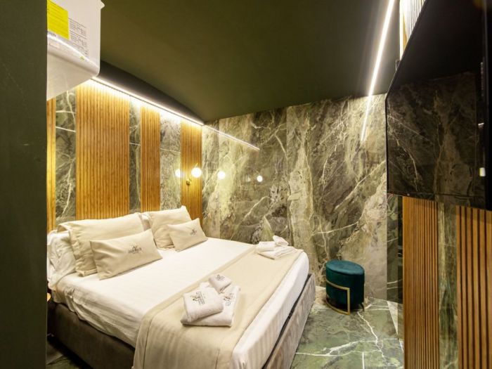 Archisio - Salvatore Sito - Progetto riflessi di marmo e ottone