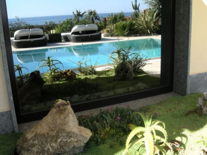 Archisio - Tiziana Galosi - Progetto Progettazione piscina e giardino di una villetta