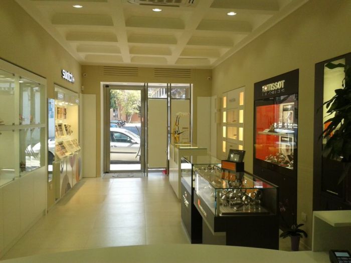 Archisio - Falegnameria Salvioli - Progetto Ristrutturazione interna di un negozio