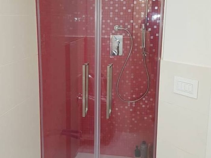 Archisio - Tortoglass - Progetto Vetri doccie e ringhiere di vetro