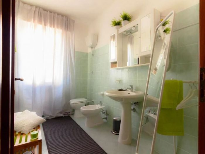 Archisio - Angela Paniccia - Progetto Profumo di lime e bamb relooking di un affittacamere