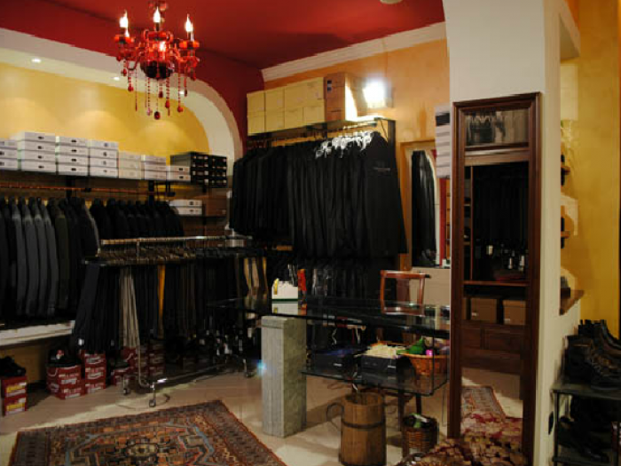 Archisio - Cotto Arredamenti - Progetto Abbigliamento e articoli regalo