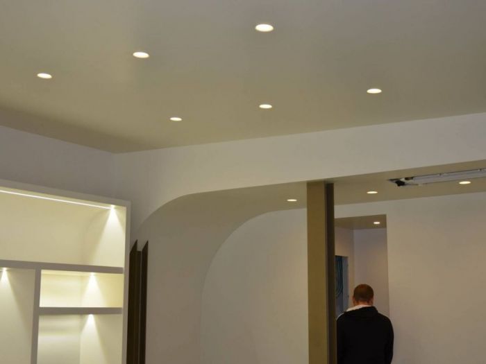 Archisio - Decora srl - Progetto Ristrutturazione negozio di abbigliamento