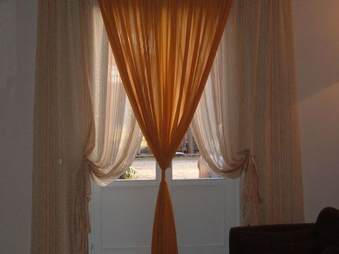 Archisio - Pezzoni Tappezzeria Tendaggi - Progetto Tende