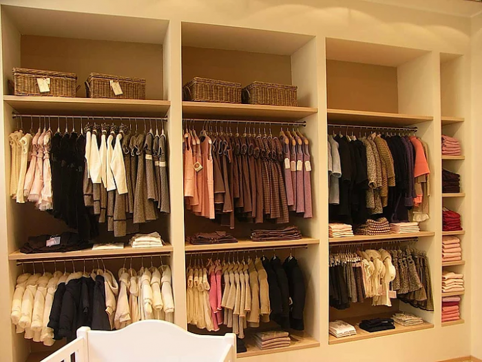 Archisio - Studio Patetta - Progetto Negozio di abbigliamento per bambini asola