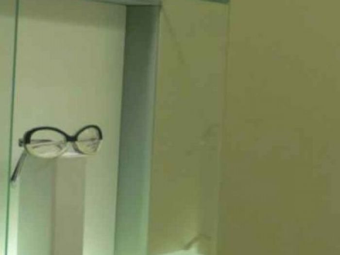 Archisio - Studio Antepost - Progetto Negozio ottica mestre