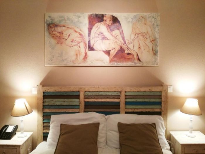 Archisio - Edodesign - Progetto Quadri presso hotel carouge e vicolo 39