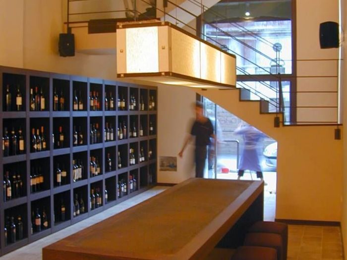 Archisio - Sid Allestimenti - Progetto Arredamento di interni di locali commerciali