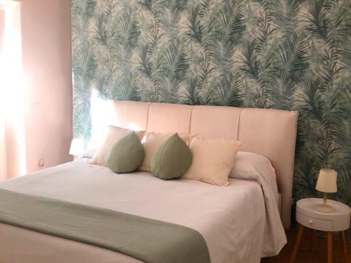 Archisio - Mani Srl Ristrutturazini - Progetto Realizzazione PrecedenteCamera da letto con armadio nascosto roma zona magliana