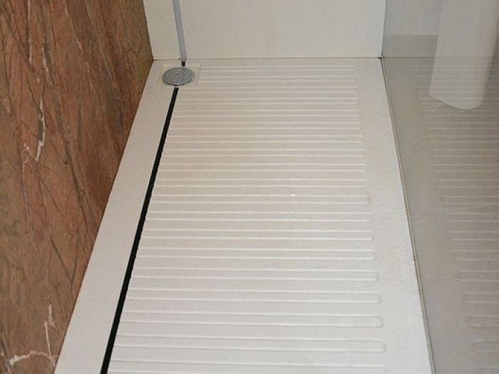 Archisio - Calabra Marmi - Progetto Bagni