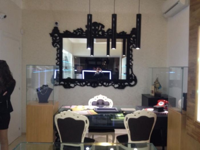 Archisio - Casesa Tiziano - Progetto Gioielleria piazza oro