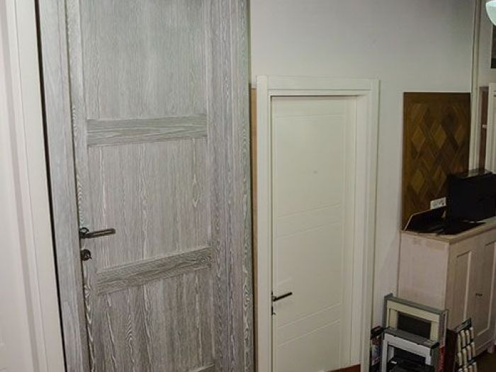 Archisio - Wood Trade Roma - Progetto Porte