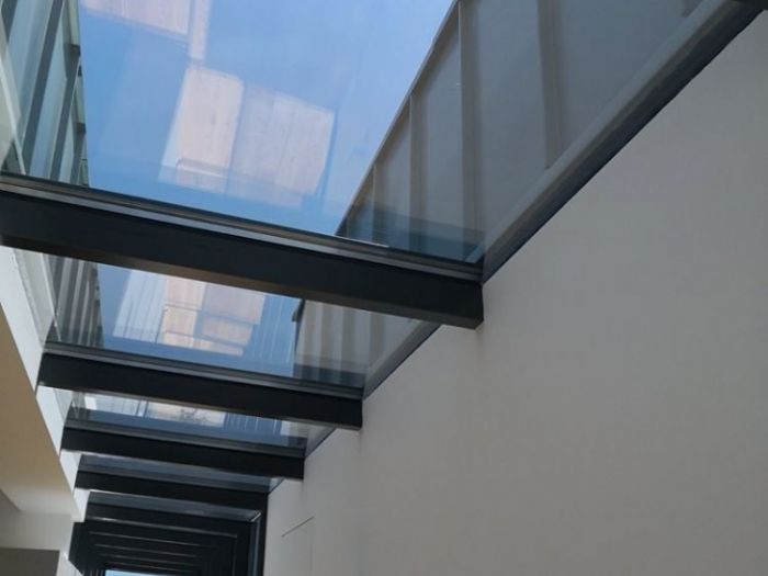 Archisio - Alfio Carmelo Lombardo - Progetto Structured attic with aluminum frames and glass titanium zinc cover