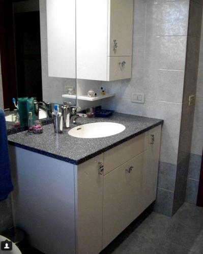 Archisio - Falegnameria Ghezzi Mario C Sas - Progetto Mobile laccato bianco lucido con piano in corian