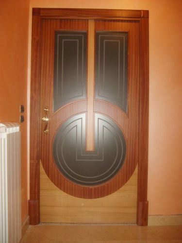 Archisio - Falegnameria Salvioli - Progetto Porta in legno