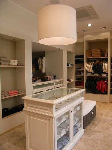 Archisio - Studio Patetta - Progetto Negozio di abbigliamento per bambini asola